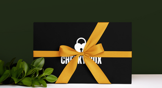 Cheeky Box Canada Adult Themed Box Wrapped with a yellow bow